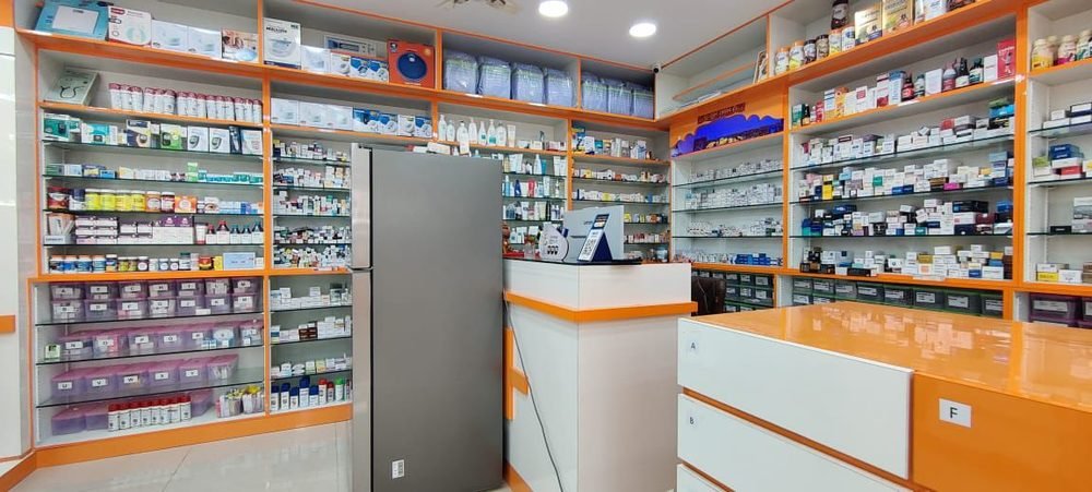 Well-stocked medicine shelves at Ramdev Medical